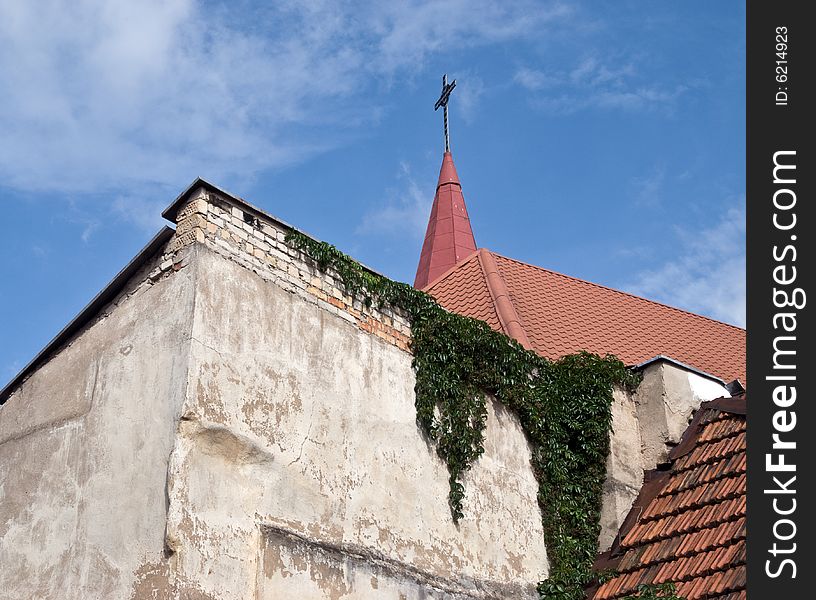 Spike of ancient church in an old city