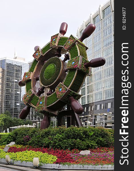 Sculpture in beijing city, wheel made of flowers. Sculpture in beijing city, wheel made of flowers