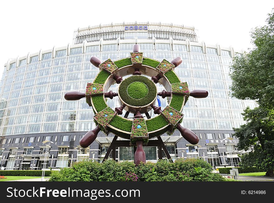 Sculpture in beijing city, wheel made of flowers. Sculpture in beijing city, wheel made of flowers