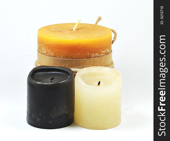 3 candles on a white background