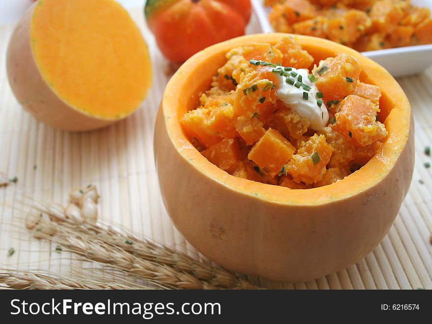 Fresh vegetables of pumpkin served in a pumpkin