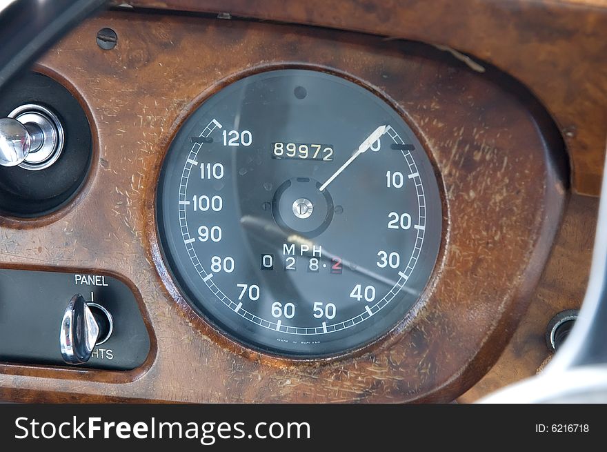 Main view of an old wooden framed speedometer