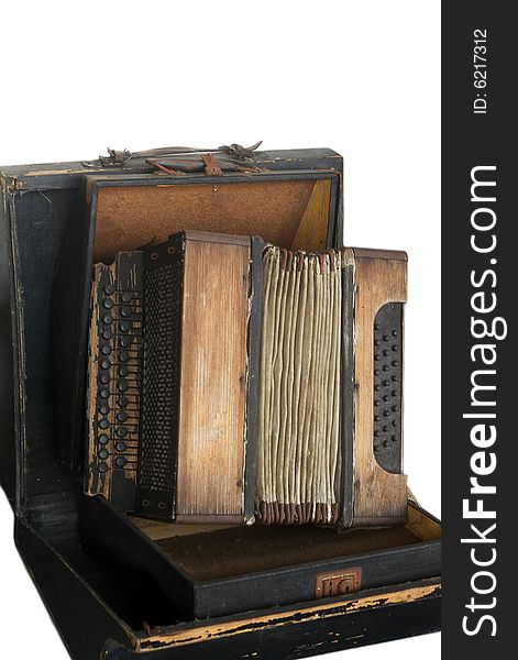 Old accordion in a box, isolated
