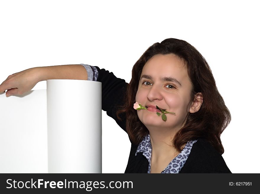 Happy girl holding a rose in her mouth