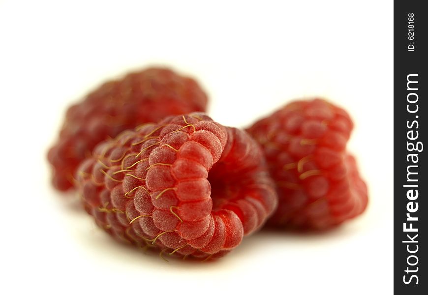 Raspberry in zoom and red fruit