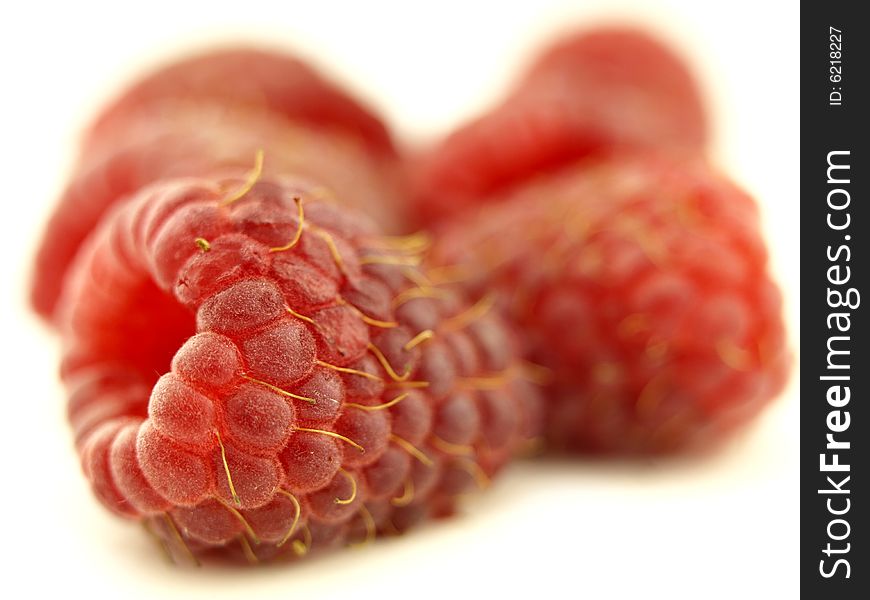 Raspberry in zoom and red fruit