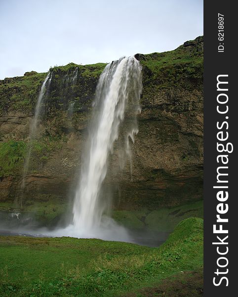 Iceland waterfall and green landscape Seljalandfoss. Iceland waterfall and green landscape Seljalandfoss