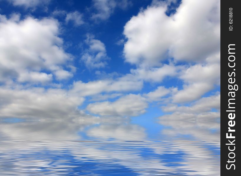 Seascape with blue sky and white clouds