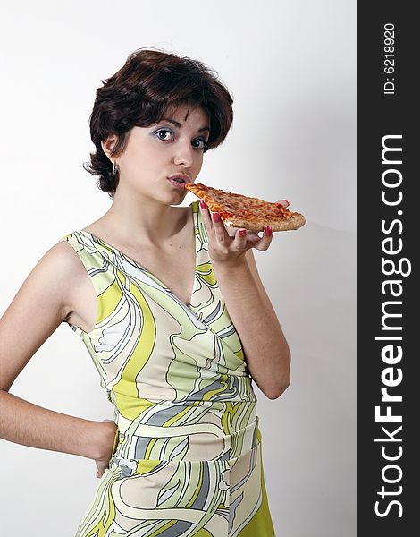 Cute girl eating pizza slice. Cute girl eating pizza slice