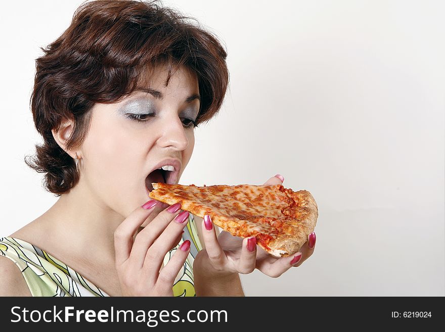 Cute girl eating pizza slice. Cute girl eating pizza slice