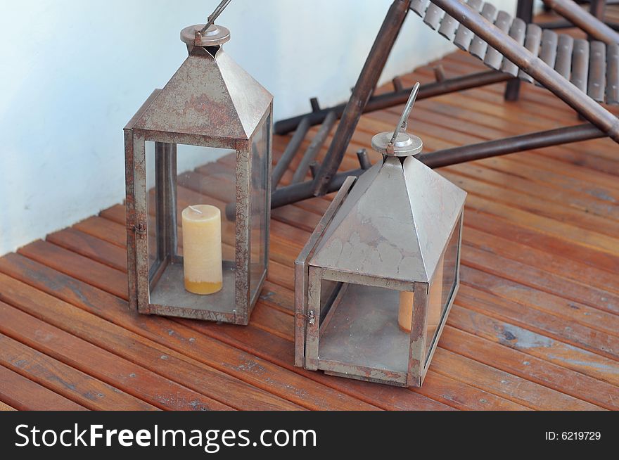 Tin lamps with a candle in it