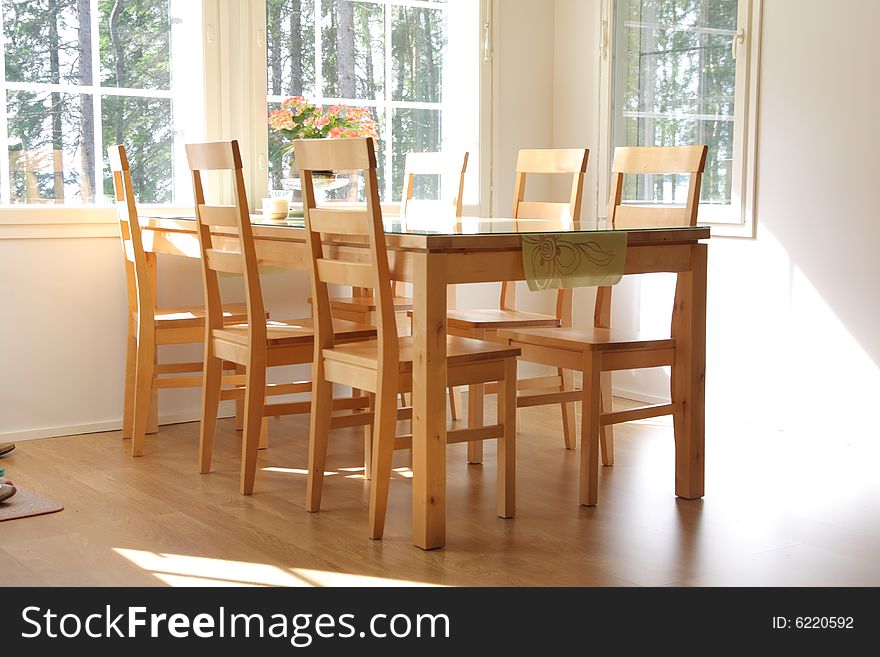 Interior of a home, dining room in sunlight. Interior of a home, dining room in sunlight