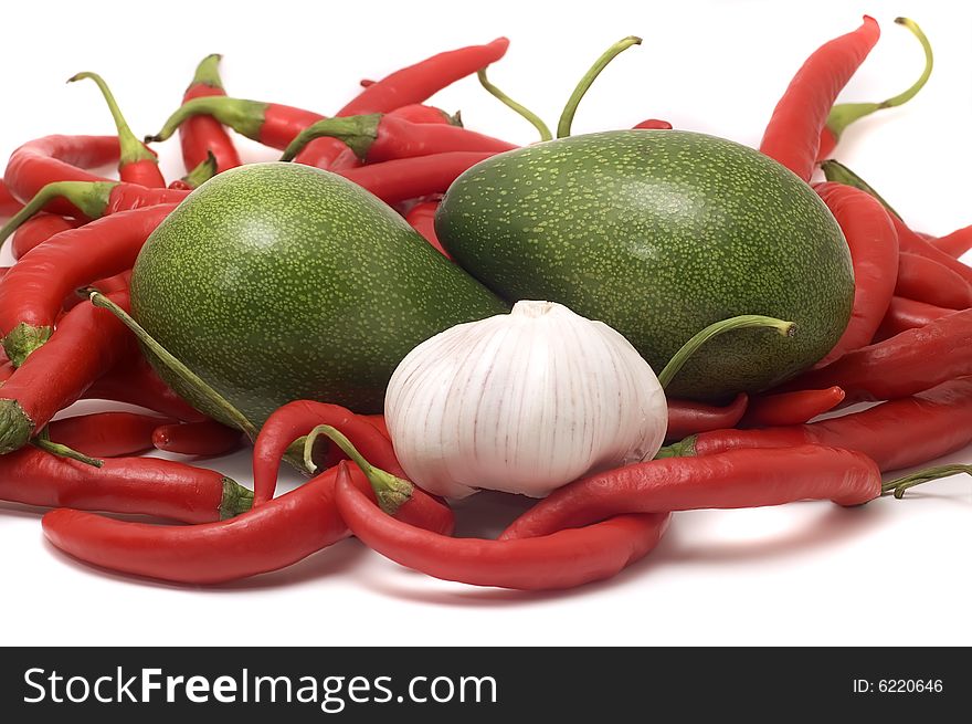 Red hot chili pepper ,avocado,garlic isolated on white