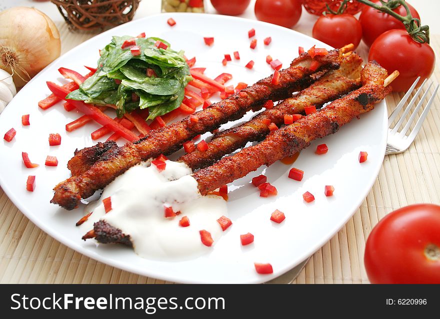 Some pork meat with fresh field Salad. Some pork meat with fresh field Salad