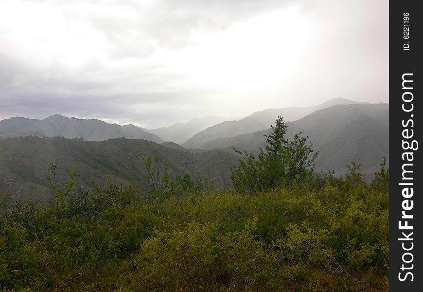 Illuminated tops of the mountains