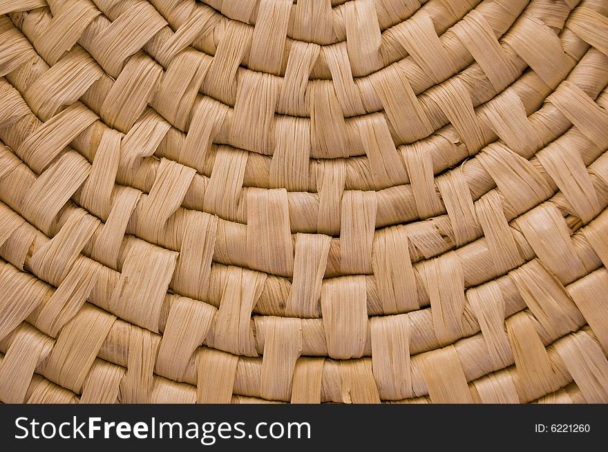 Detail of a container made of straw, with medium contrast. Detail of a container made of straw, with medium contrast