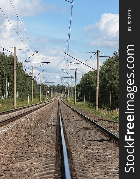 Railway track with blue sky