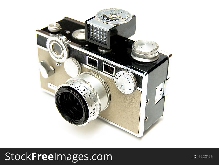 Two tone vintage 35mm film camera with flash attached isolated on a white background. Two tone vintage 35mm film camera with flash attached isolated on a white background.