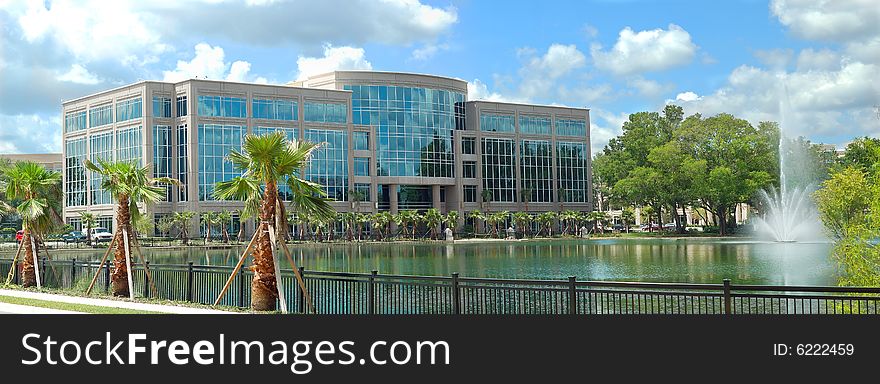 Office building with fountain and retention pond. Office building with fountain and retention pond.
