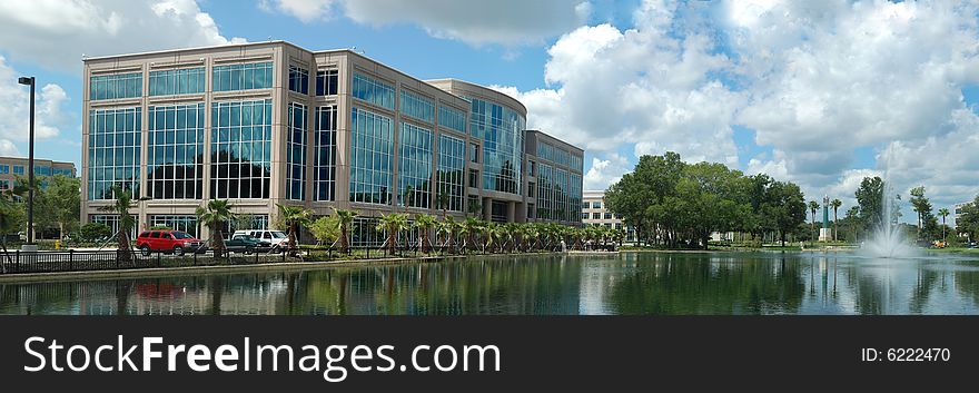 Office building with fountain and retention pond. Office building with fountain and retention pond.