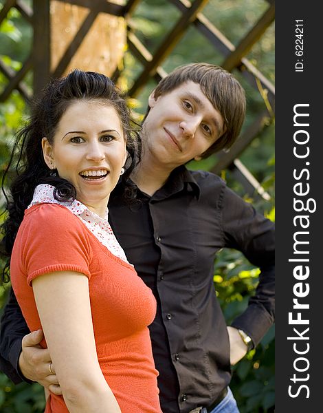 Outdoor portrait of young happy couple