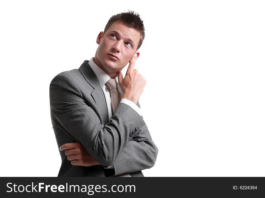 Young businessman thinking, isolated over white background