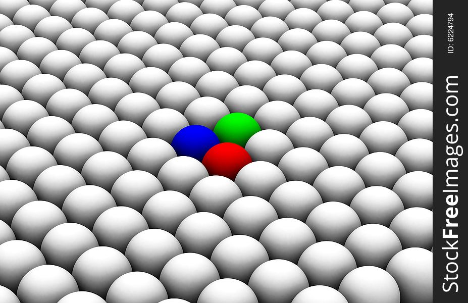 Three colored spheres among the white ones. Three colored spheres among the white ones