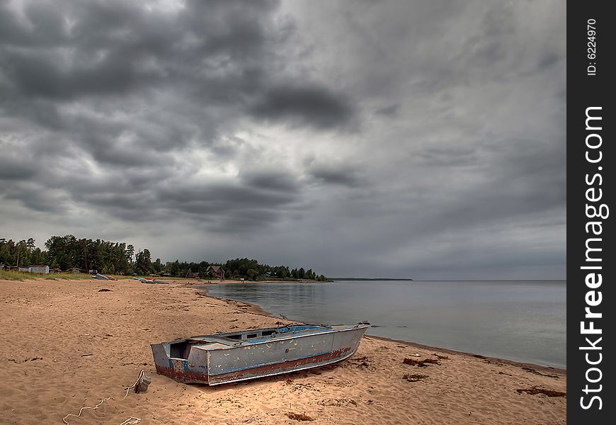Boat on the shore of the Ladoga lake, Russia. Boat on the shore of the Ladoga lake, Russia