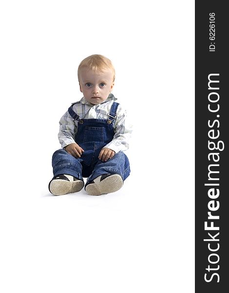 Sitting boy on white background