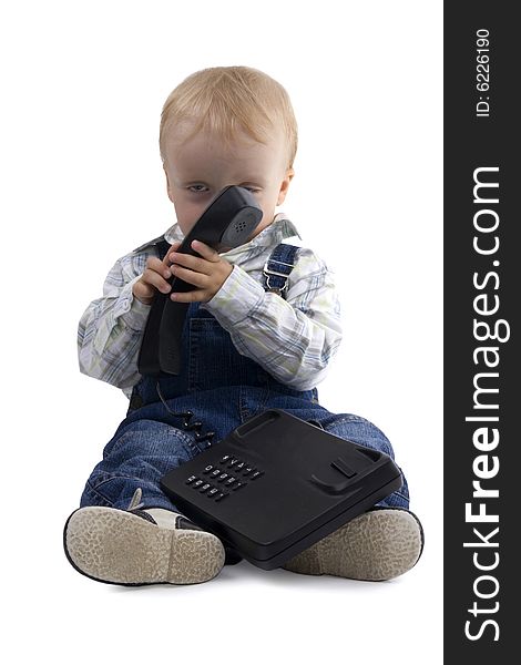 Tired sitting boy with phone on white background. Tired sitting boy with phone on white background