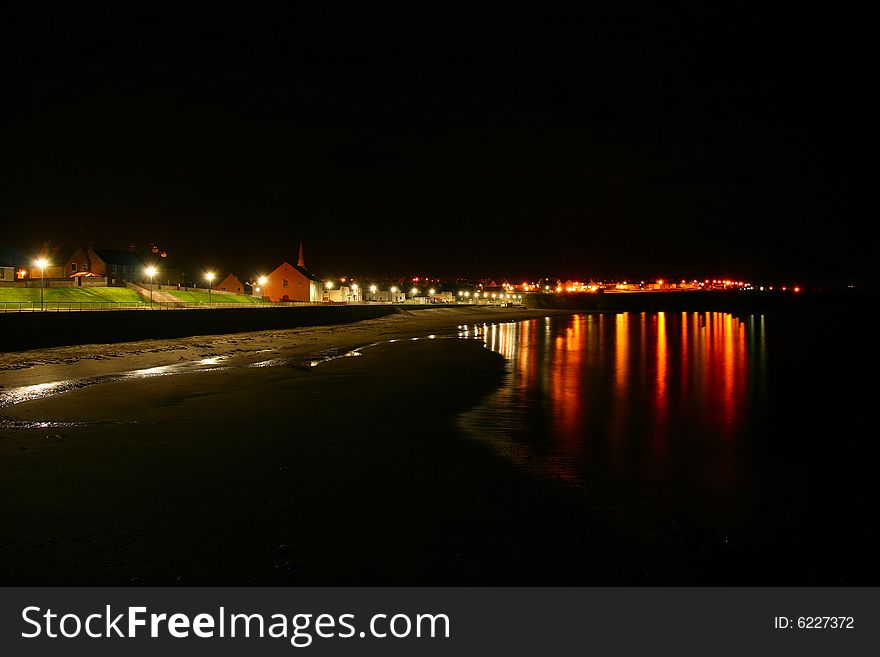 A look along the beach, the promenade and streets at night. Thurso in Scotland. Famous for it's surfing. A look along the beach, the promenade and streets at night. Thurso in Scotland. Famous for it's surfing.