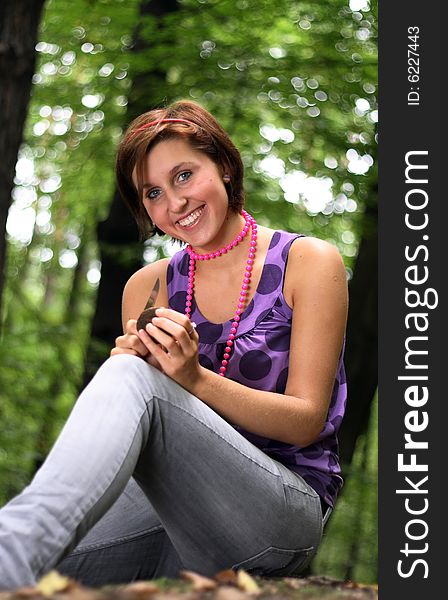 Beautiful student holding the mushroom in her hands.This high resolution image was taken by 10 mp Canon camera with professional lens. Beautiful student holding the mushroom in her hands.This high resolution image was taken by 10 mp Canon camera with professional lens.