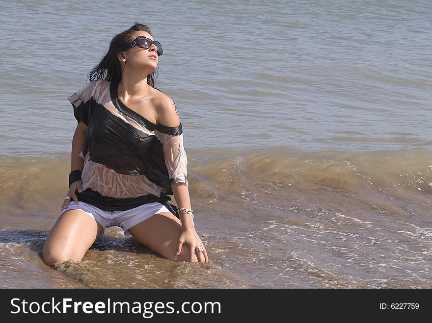 Woman In The Seaside With Sun Glasses