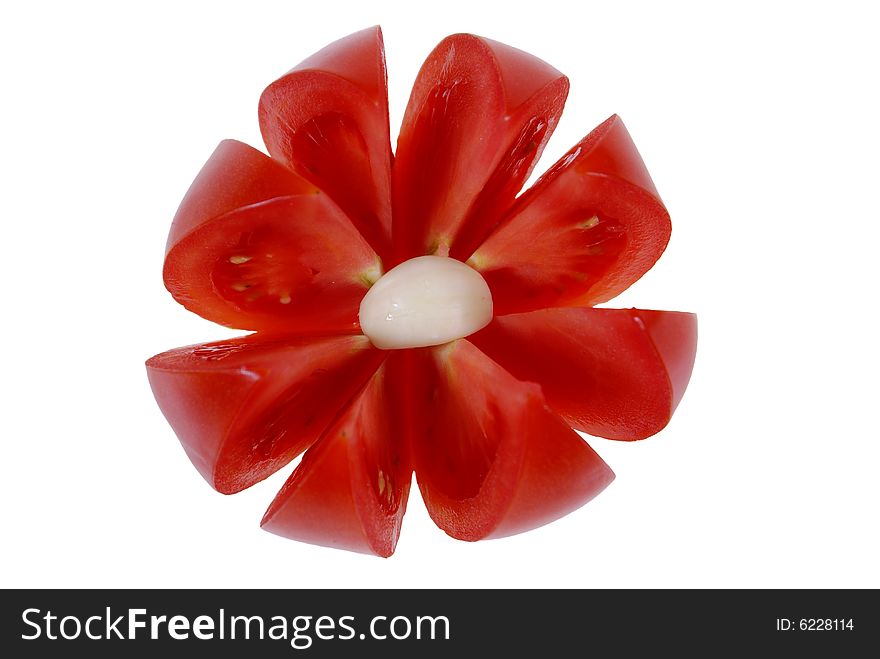 Tomato arranged in flower form isolated on white background