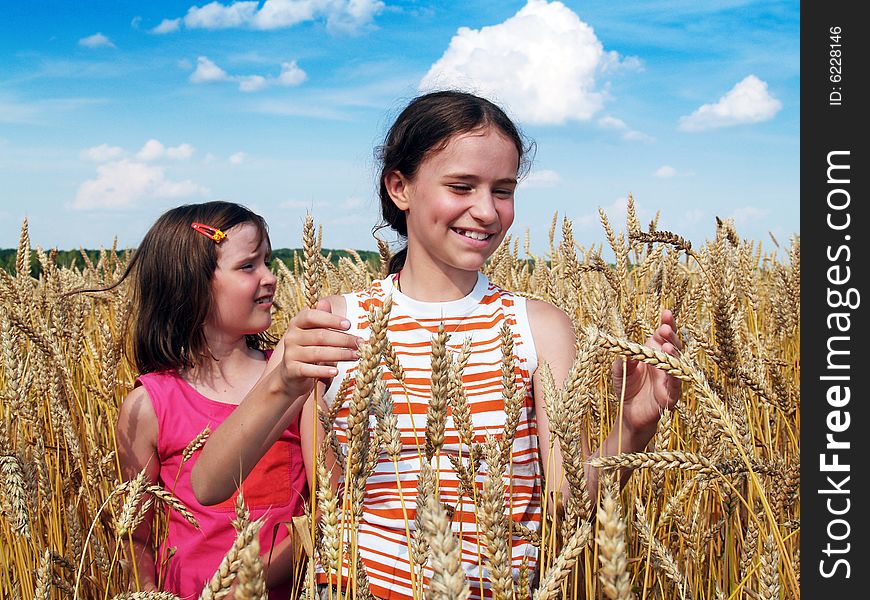 Happy girls on a field