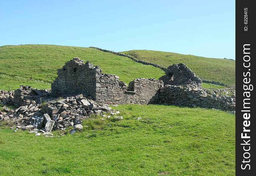 The remains of a small stone house in Ireland. The remains of a small stone house in Ireland.