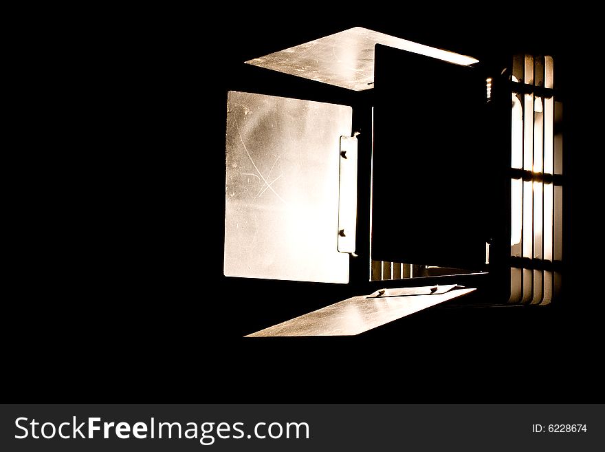 Studio light the barn door model with a bright light aiming sideways