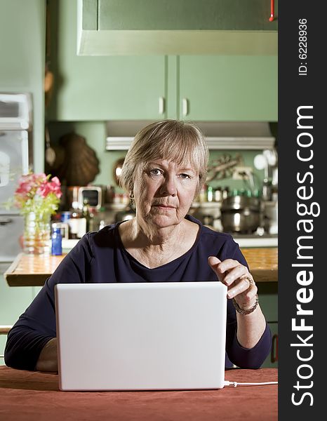 Senior Woman with a Laptop Computer