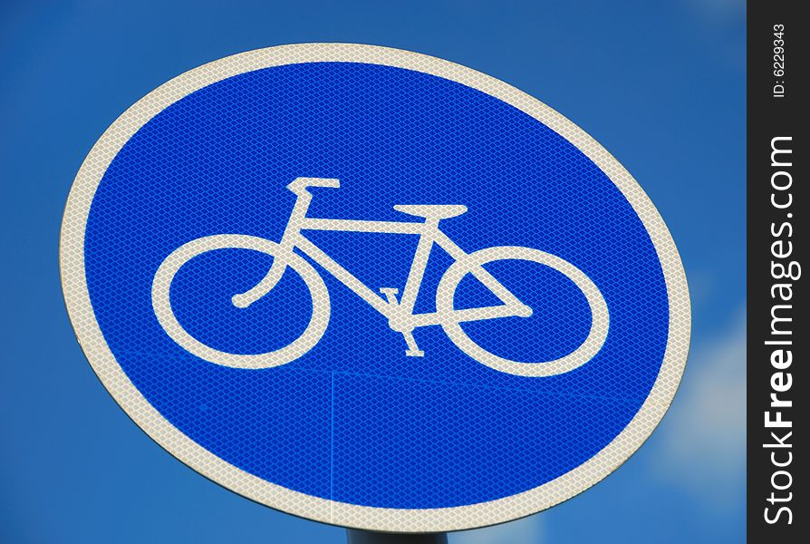 Bicycle road sign with blue sky background
