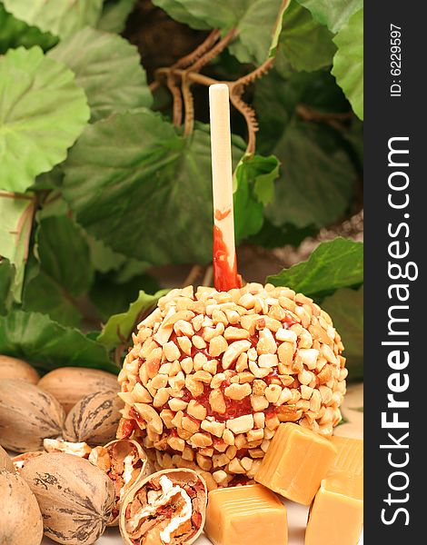 Single Caramel Apple With Ingredients Vertical