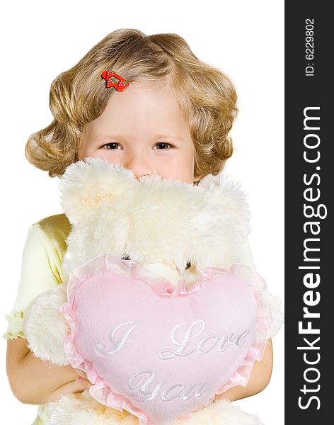 Small beautiful girl holding white teddy bear. Small beautiful girl holding white teddy bear