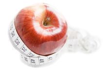 Apple With Measuring Tape Stock Photo