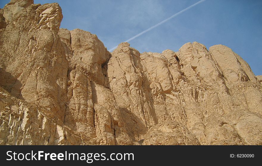 Luxor.egypt.rocks are above the temple of hatshepsut queen