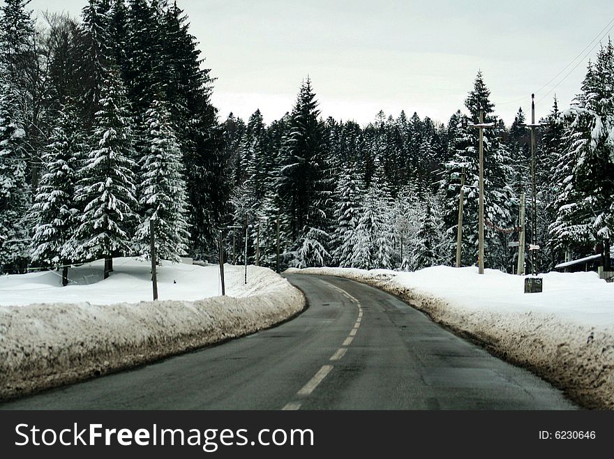 A long road full of snow. A long road full of snow