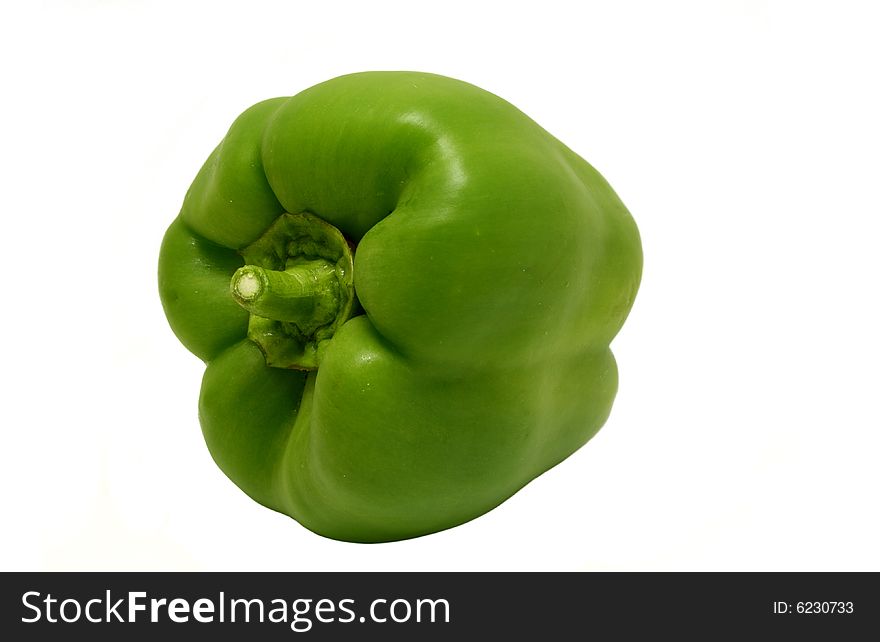 A green bell pepper isolated on a white background.