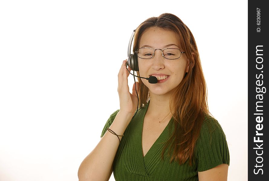 Beautiful young female switchboard operator with headset. Beautiful young female switchboard operator with headset