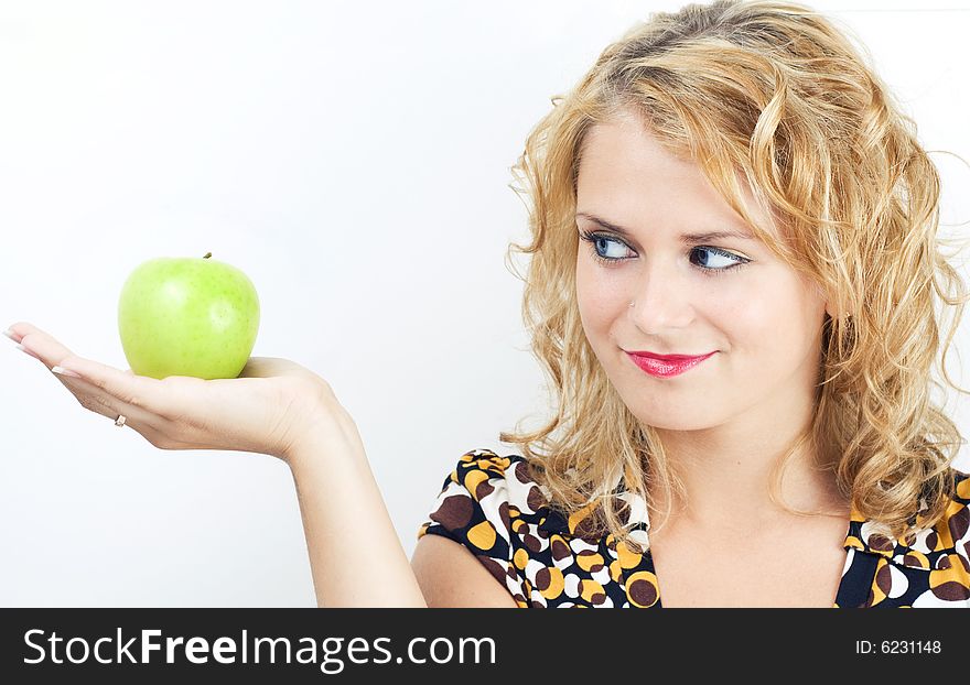 Young Cute Girl Holding Apple.