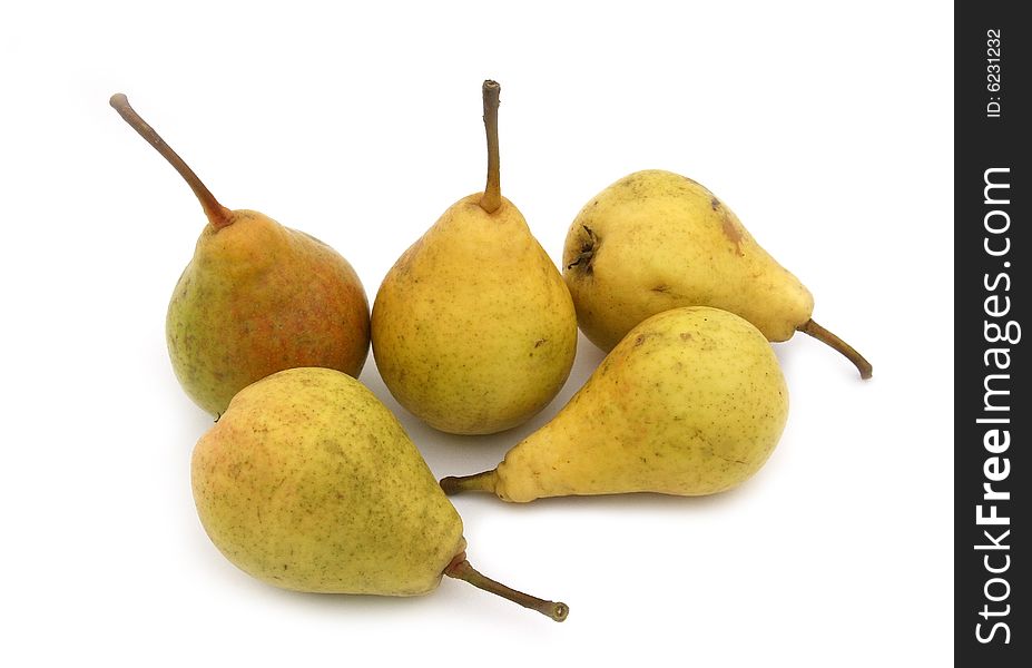 Fruit of a pear yellow and green on a white background