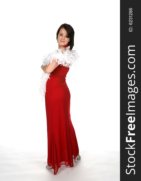 Teen in formal red gown and white feather boa. Teen in formal red gown and white feather boa