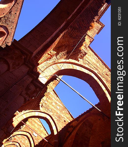 A suggestive shot of the uncover aisles in San Galgano abbey. A suggestive shot of the uncover aisles in San Galgano abbey